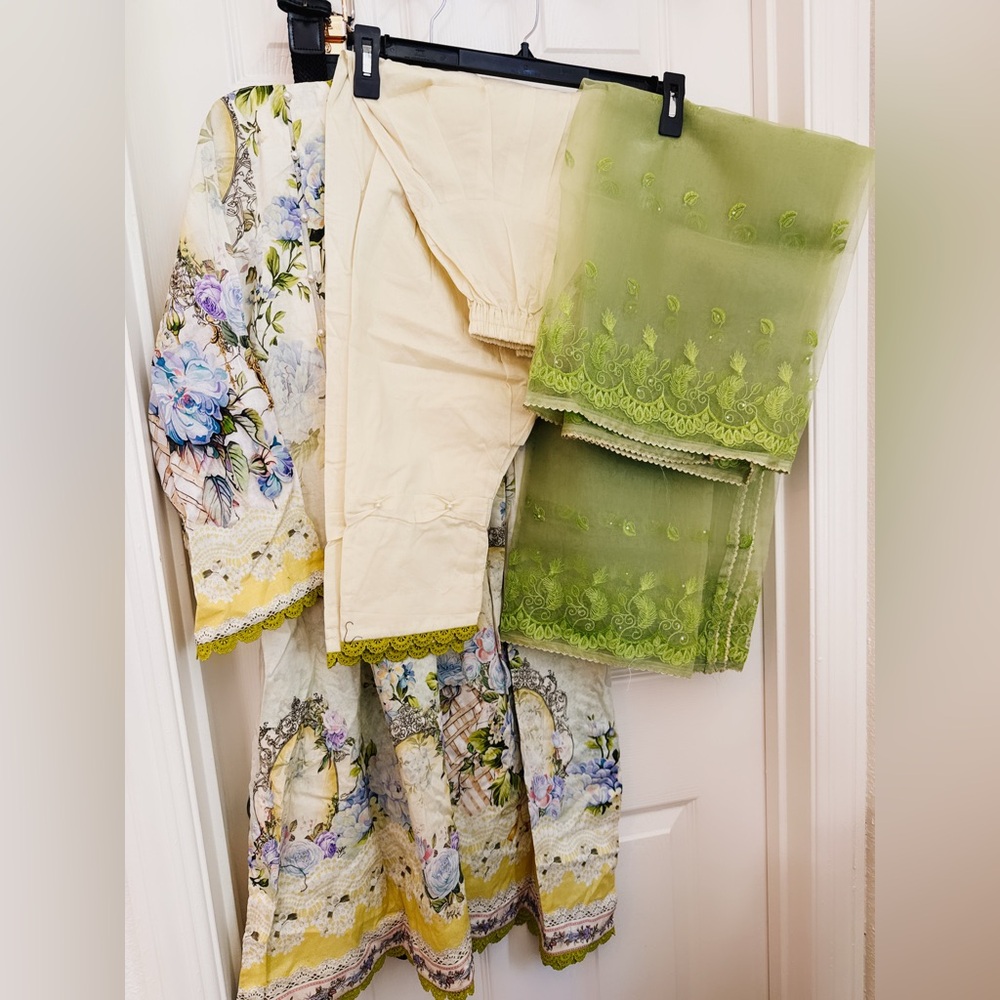 Floral women outfit with Blue and Green Accents and lace detailing